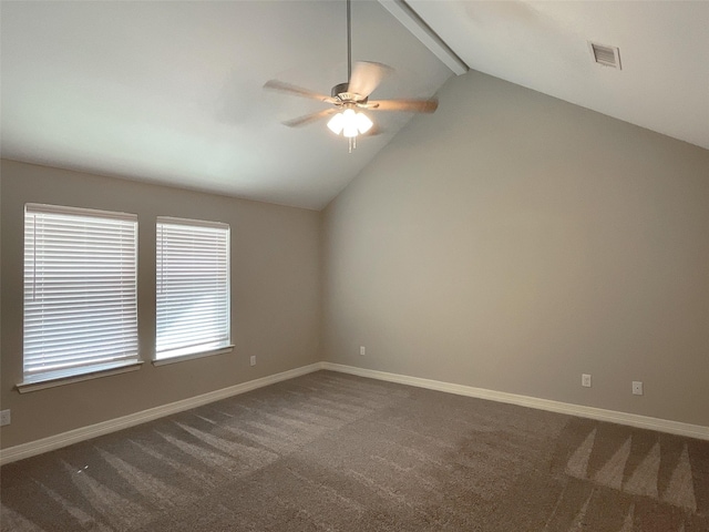 unfurnished room with lofted ceiling with beams, ceiling fan, and carpet flooring