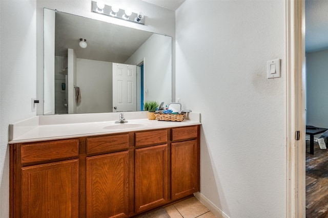 bathroom featuring tile patterned floors and vanity