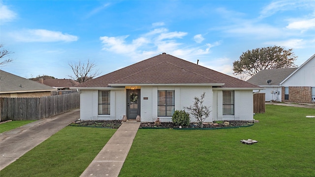 view of front of home with a front lawn