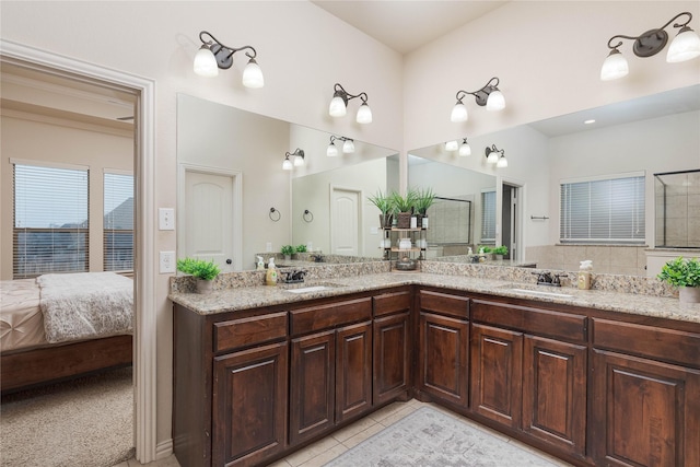 bathroom with tile patterned flooring and vanity