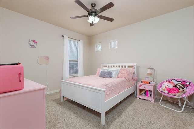 bedroom featuring ceiling fan and light colored carpet