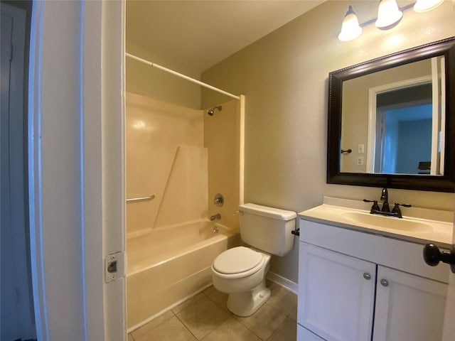 full bathroom featuring tile patterned floors, toilet, shower / washtub combination, and vanity