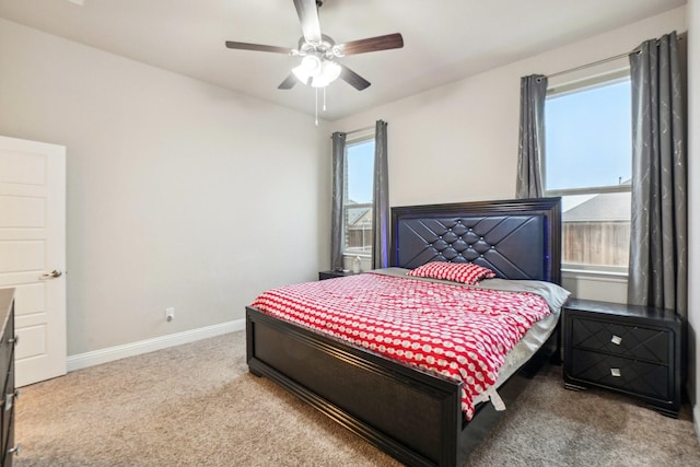 bedroom with ceiling fan and carpet