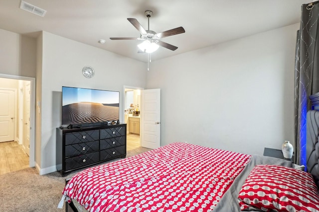 bedroom with light colored carpet and ceiling fan