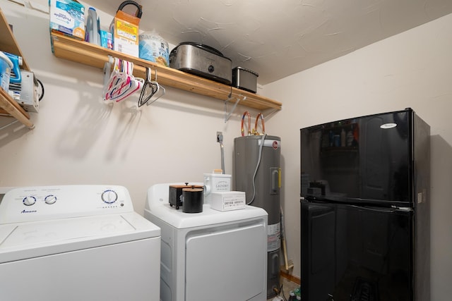 washroom with separate washer and dryer and electric water heater