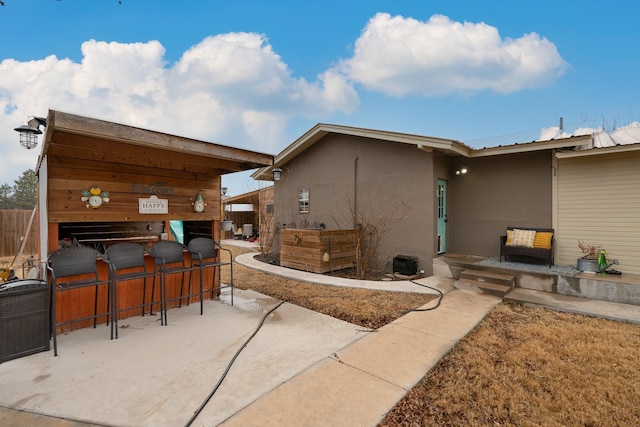 view of patio / terrace with a bar