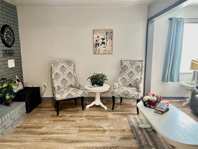 living area with light hardwood / wood-style floors