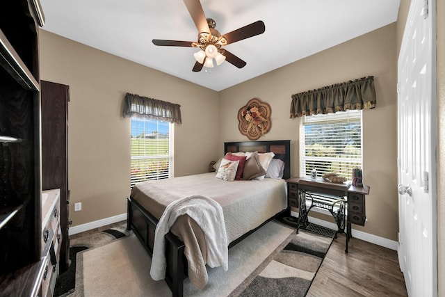 bedroom featuring ceiling fan and light hardwood / wood-style flooring