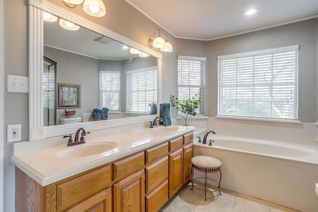 bathroom featuring crown molding, a tub to relax in, tile patterned floors, and a healthy amount of sunlight