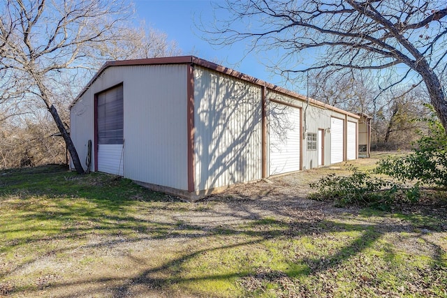 view of outdoor structure with a garage