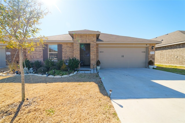 ranch-style home featuring a garage