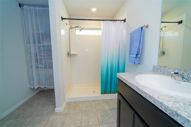 bathroom with vanity, tile patterned floors, and a shower with shower curtain