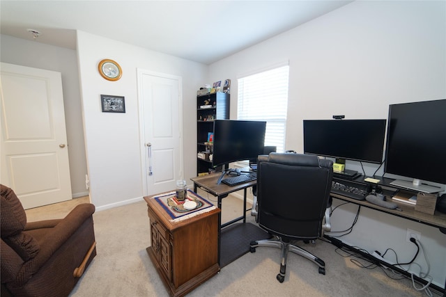 home office with light colored carpet