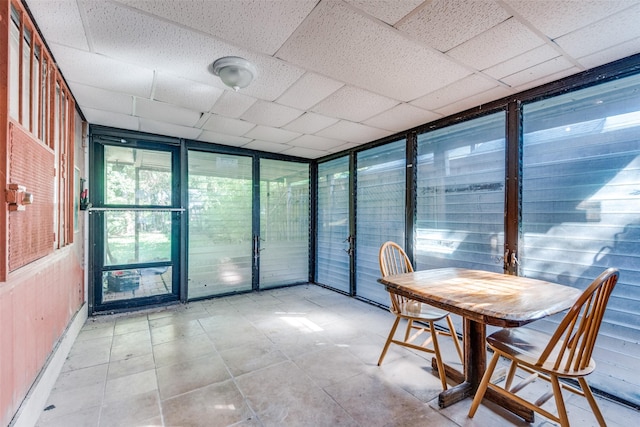 sunroom with a paneled ceiling