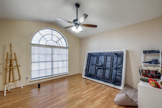 surrounding community with ceiling fan