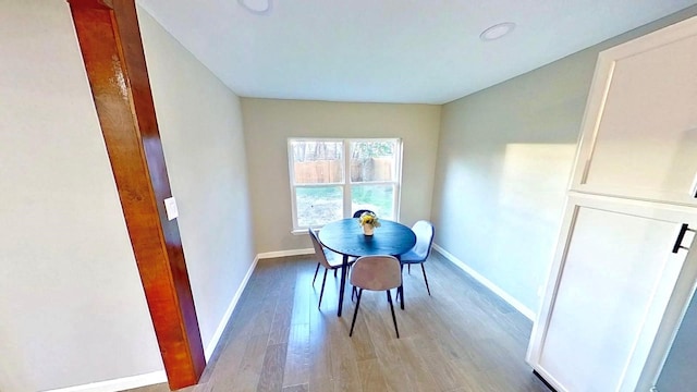 dining room featuring light hardwood / wood-style flooring