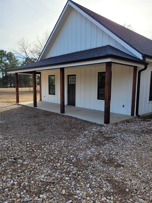 back of property featuring a patio