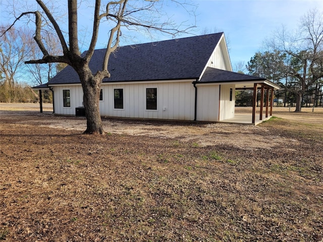 view of property exterior featuring central AC unit and a patio area