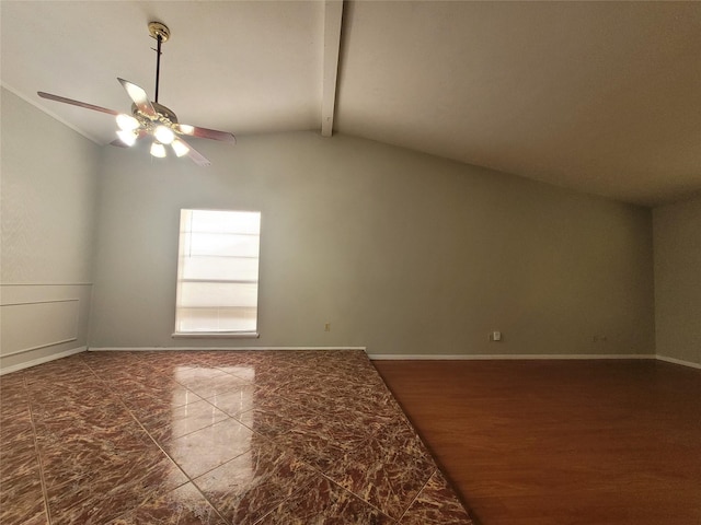 empty room featuring vaulted ceiling with beams and ceiling fan