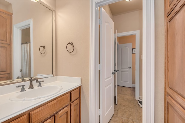 bathroom with vanity and tile patterned floors