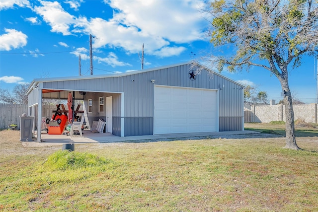 garage with a lawn