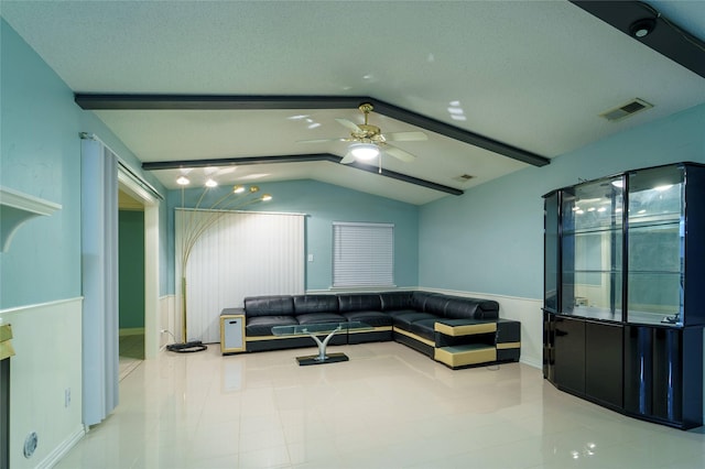 living room with vaulted ceiling with beams and ceiling fan