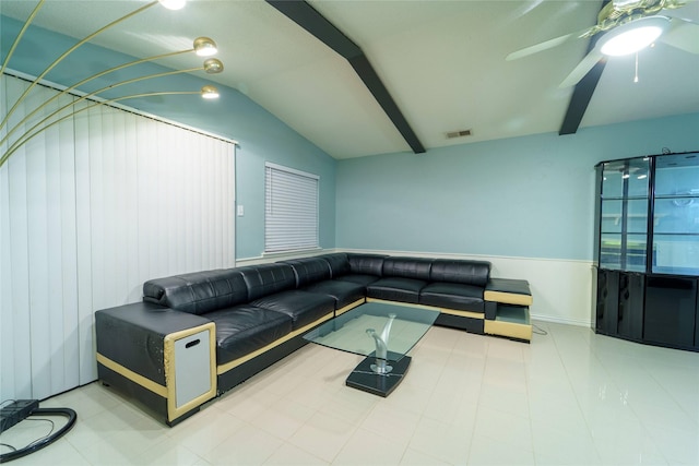 living room featuring lofted ceiling with beams