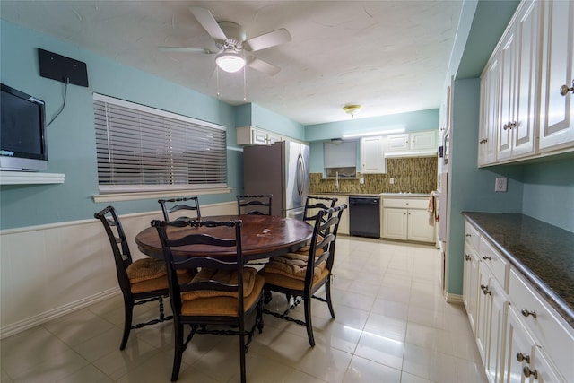 dining room featuring ceiling fan