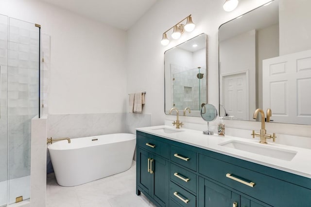 bathroom featuring vanity and shower with separate bathtub