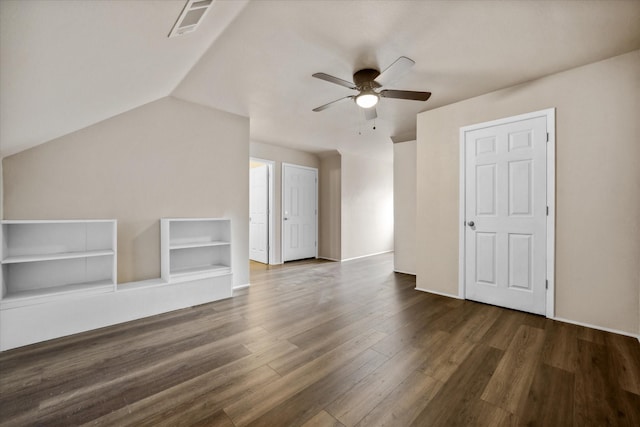 bonus room featuring ceiling fan, lofted ceiling, and dark hardwood / wood-style flooring