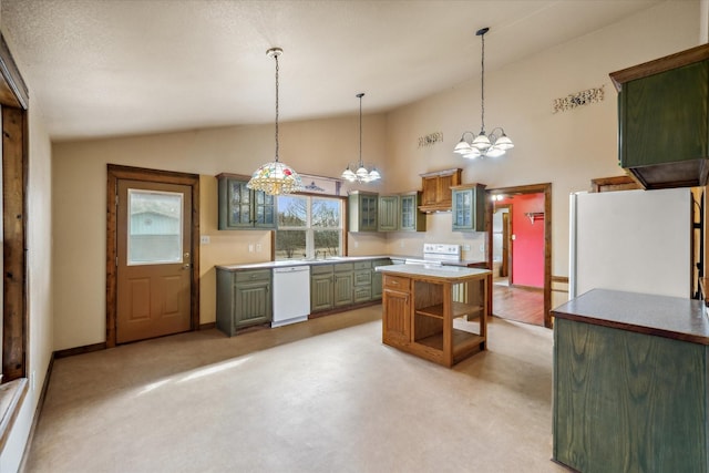 kitchen with sink, green cabinetry, a center island, high vaulted ceiling, and white appliances