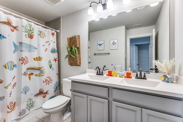 full bathroom featuring vanity, toilet, and shower / bath combo with shower curtain