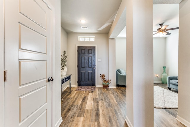 entryway featuring hardwood / wood-style flooring