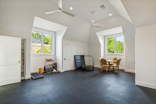 additional living space with vaulted ceiling and ceiling fan