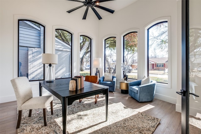 interior space featuring ceiling fan and light hardwood / wood-style floors