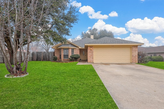 ranch-style home with a garage and a front yard