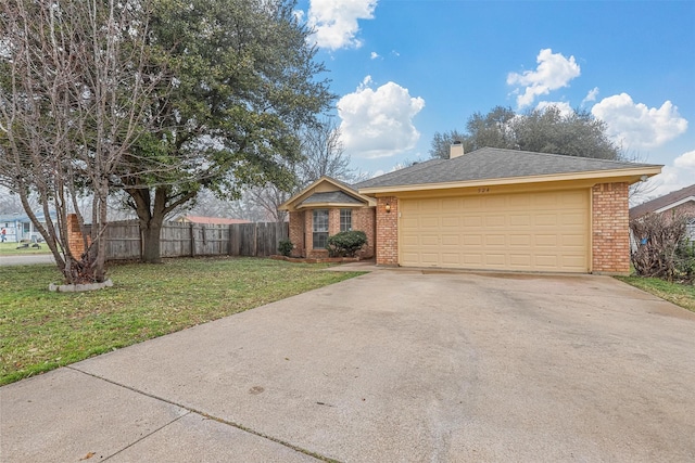 single story home featuring a garage and a front lawn