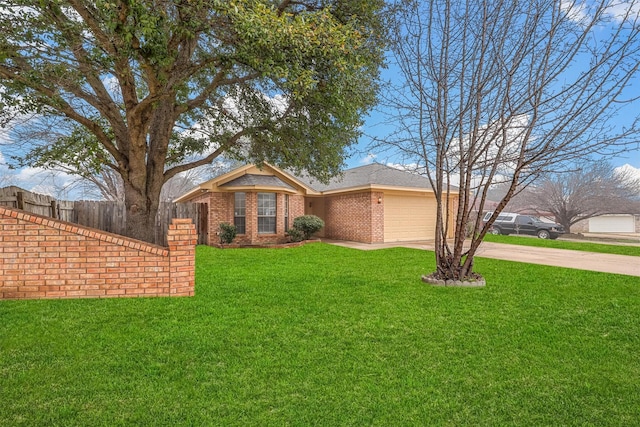 ranch-style house with a garage and a front yard