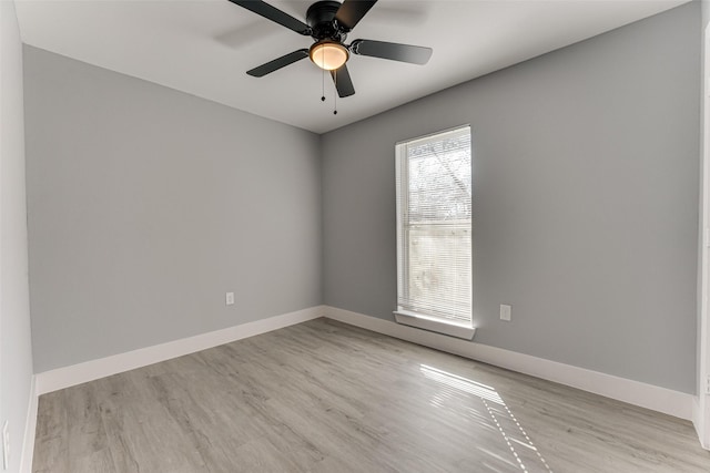 unfurnished room with light hardwood / wood-style flooring and ceiling fan