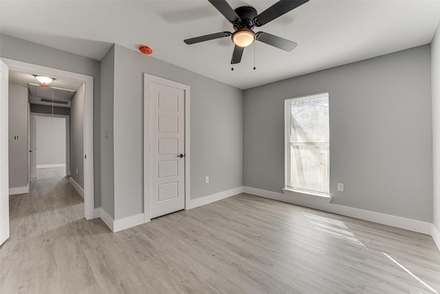 unfurnished bedroom featuring ceiling fan and light wood-type flooring