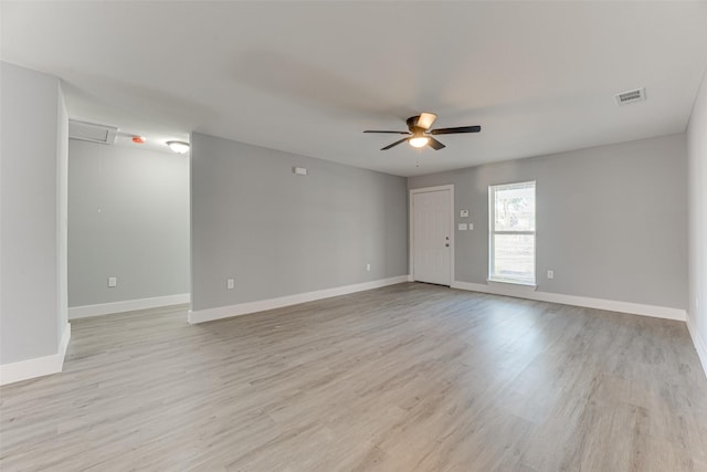 unfurnished room featuring light hardwood / wood-style floors and ceiling fan