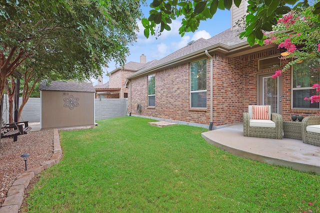 view of yard featuring a patio and a storage shed