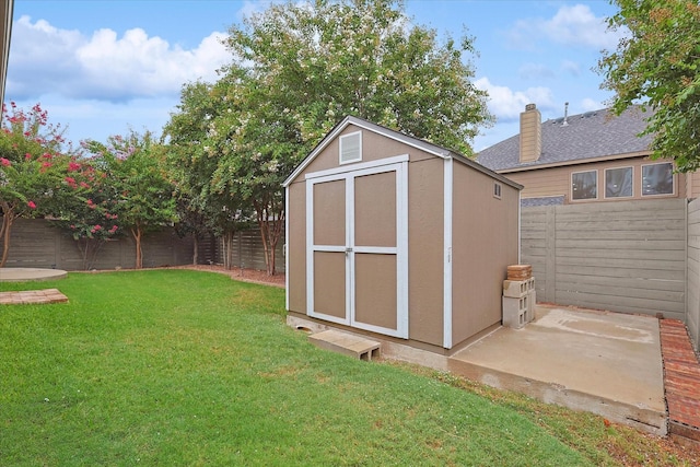 view of outdoor structure with a lawn