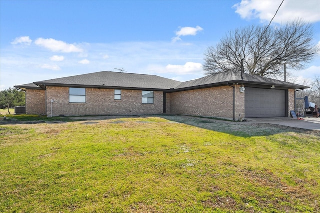 view of property exterior with a garage, a lawn, and central air condition unit