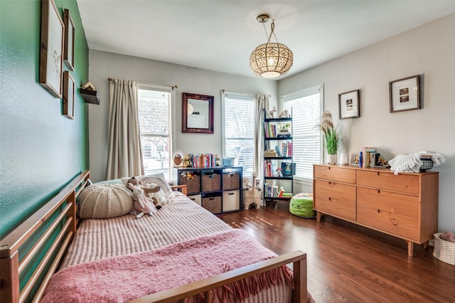 bedroom featuring dark hardwood / wood-style floors