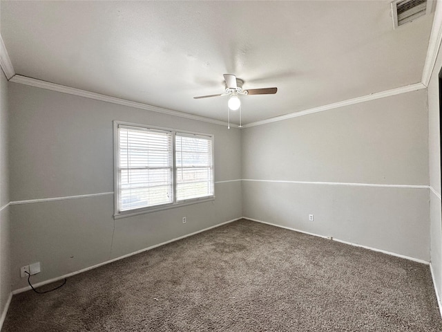 unfurnished room featuring ornamental molding, carpet floors, and ceiling fan