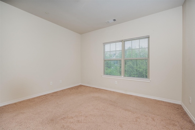 empty room featuring carpet floors