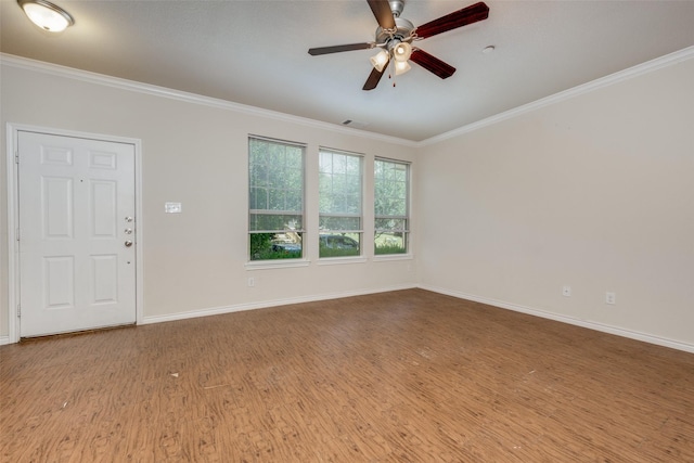 unfurnished room with wood-type flooring, ornamental molding, and ceiling fan