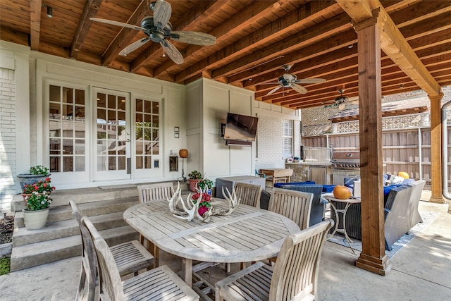 view of patio / terrace featuring ceiling fan