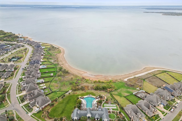 aerial view with a residential view and a water view